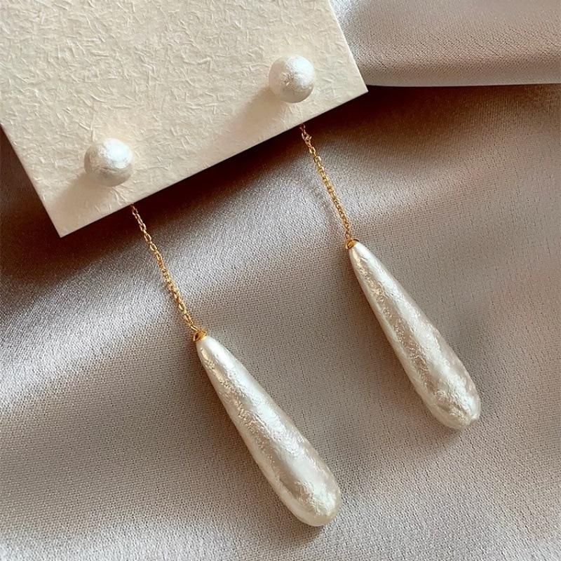 Retro and Trendy Teardrop Shaped Imitation Pearl Tassel Earrings, Women s Elegant Temperament Holiday Accessories Zircon
Retro and Trendy Teardrop Shaped Imitation Pearl Tassel Earrings, Women s Elegant Temperament Holiday Accessories Zircon