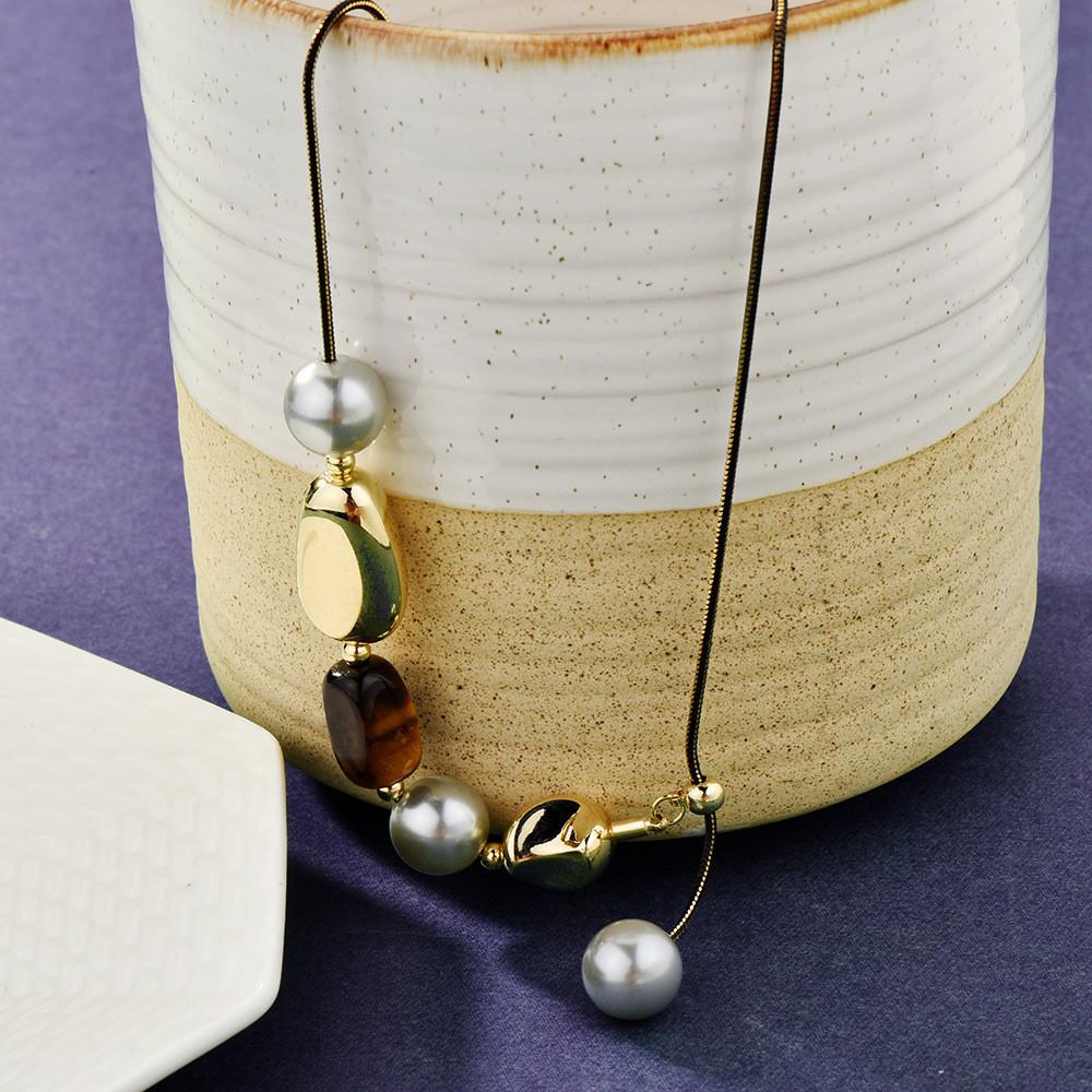 Contemporary Silver Snake Chain Necklace Featuring Tiger Eye Stone And Crystal Pendant
Contemporary Silver Snake Chain Necklace Featuring Tiger Eye Stone And Crystal Pendant