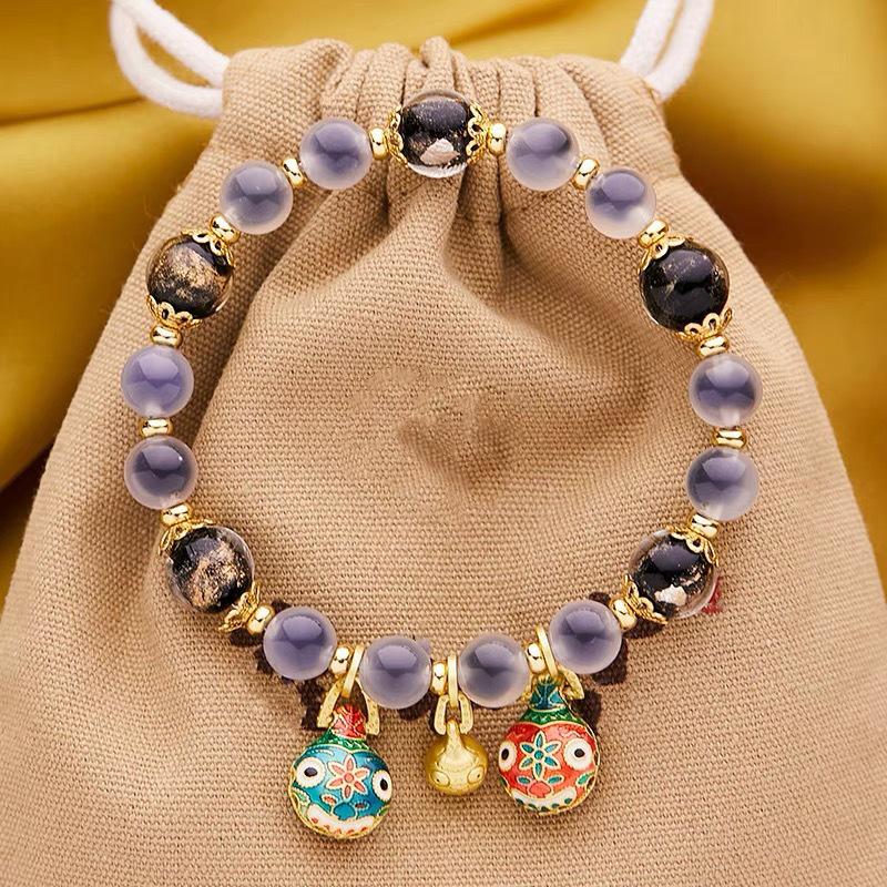 High-End Gold Foil Glass Agate Bracelet with Pi Xiu Charm
High-End Gold Foil Glass Agate Bracelet with Pi Xiu Charm