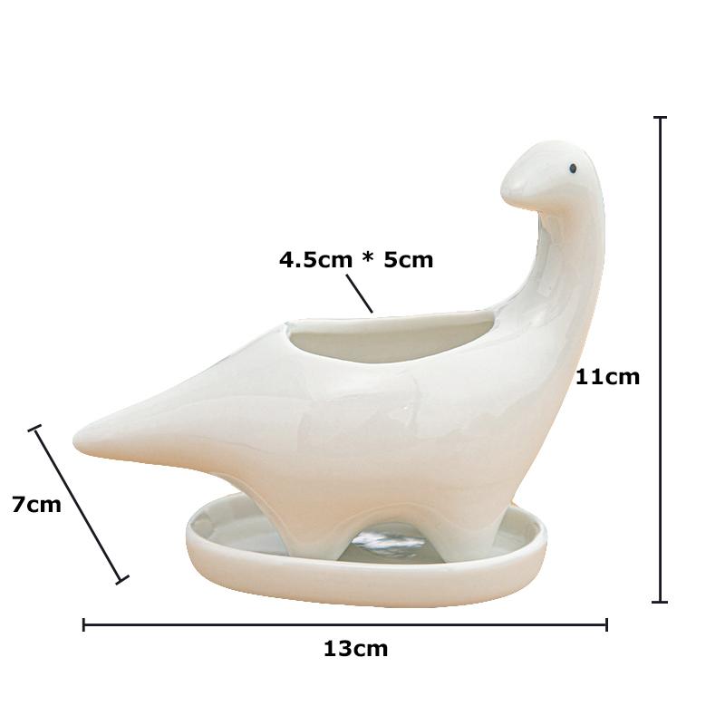 White Ceramic Dinosaur Flower Pot with Tray Succulents Planter Container Desktop Figurine Home Garden Decoration Brachiosaurus
White Ceramic Dinosaur Flower Pot with Tray Succulents Planter Container Desktop Figurine Home Garden Decoration Brachiosaurus