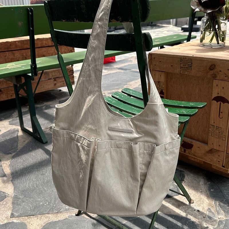 Yizhi South-South Identical Bag Korean One-shoulder Underarm Tote Large Capacity Multi-pocket Fashionable Commuter белый
Yizhi South-South Identical Bag Korean One-shoulder Underarm Tote Large Capacity Multi-pocket Fashionable Commuter белый