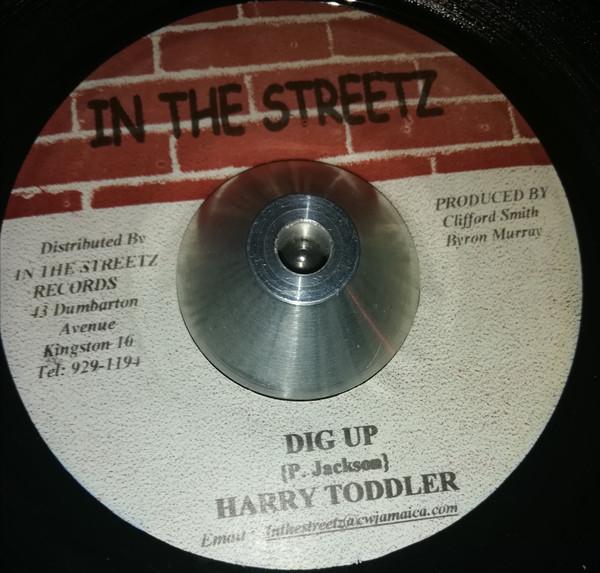7inch Record HARRY TODDLER - Dig Up NONE In The Streetz Jamaica Reggae, Ska & Dub Used
7inch Record HARRY TODDLER - Dig Up NONE In The Streetz Jamaica Reggae, Ska & Dub Used