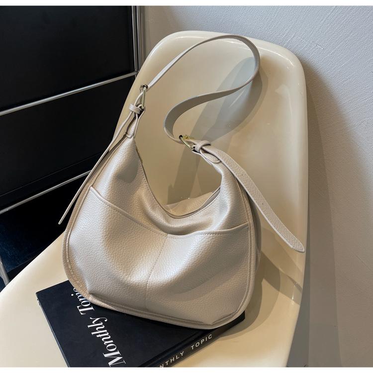 Ретро сумка женская большая вместимость 2024 новая осенне-зимняя повседневная сумка-мессенджер нишевый дизайн сумка для пончиков бежевый
Ретро сумка женская большая вместимость 2024 новая осенне-зимняя повседневная сумка-мессенджер нишевый дизайн сумка для пончиков бежевый