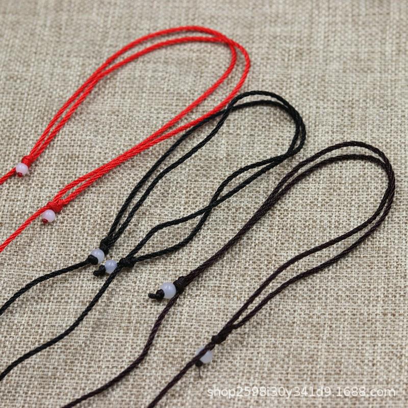 Adjustable Hand-Woven Red Cord Necklace with Gold Jadeite Pendant Black Cord Single
Adjustable Hand-Woven Red Cord Necklace with Gold Jadeite Pendant Black Cord Single