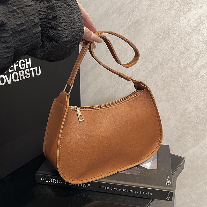 Popular fashion Korean version shoulder bag women s summer new ins solid color gentle and simple crescent bag коричневий
Popular fashion Korean version shoulder bag women s summer new ins solid color gentle and simple crescent bag коричневий