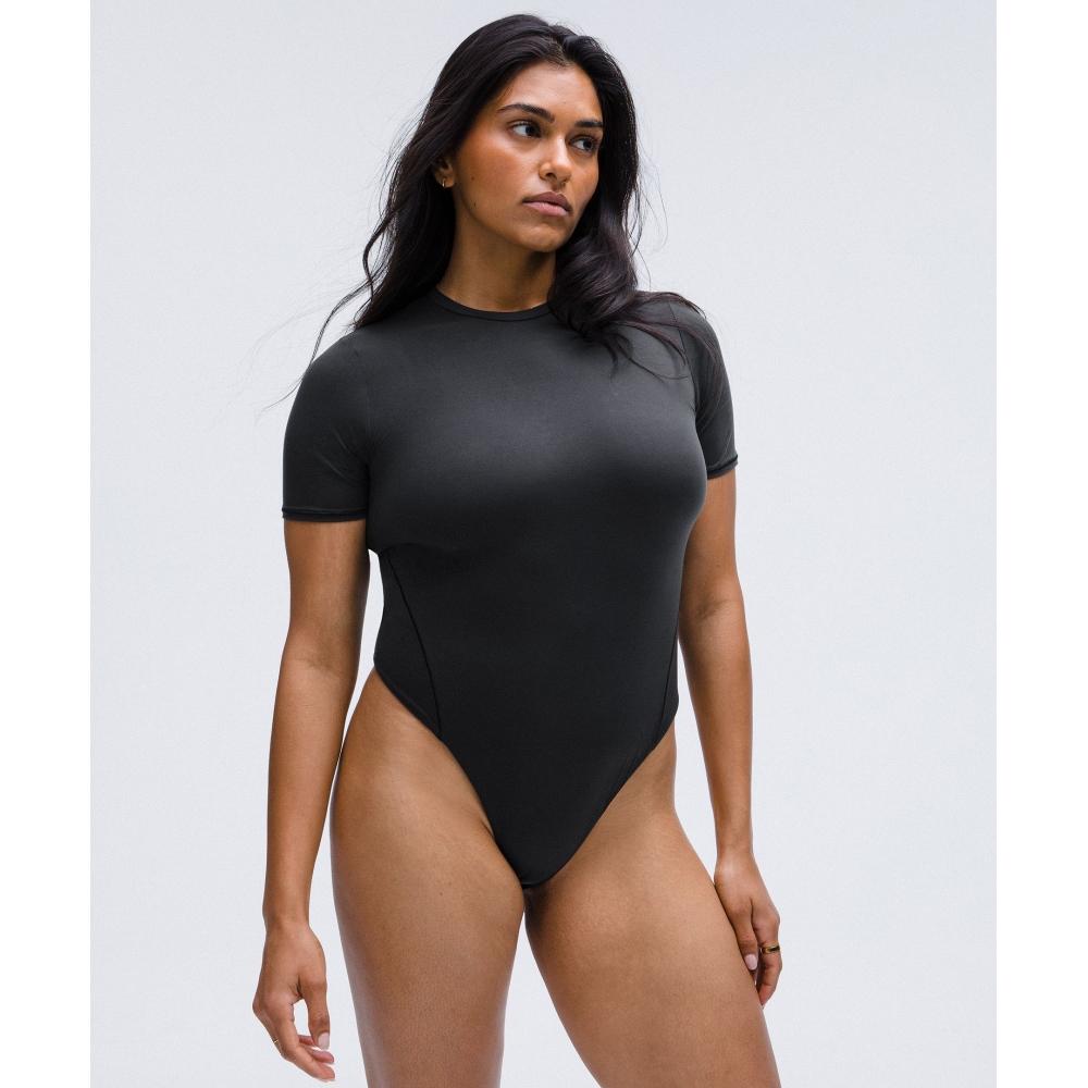Lululemon Wundermost Ультрамягкий боди Nulu с короткими рукавами и стрингами, черный XS
Lululemon Wundermost Ультрамягкий боди Nulu с короткими рукавами и стрингами, черный XS