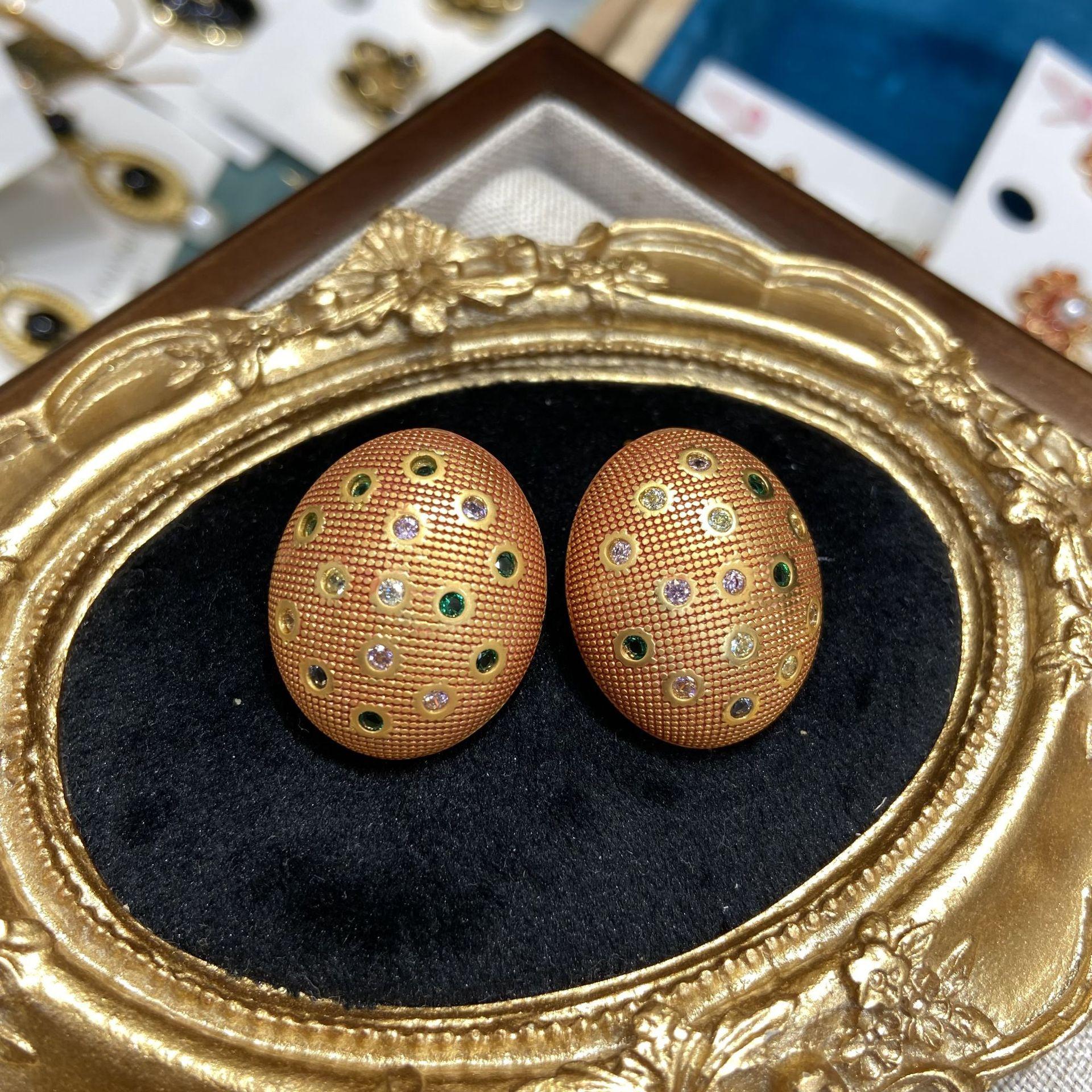 Colored Zircon High-End Earrings, Fashionable Light Luxury Oval Egg Shape, Concave And Bumpy Design Earrings
Colored Zircon High-End Earrings, Fashionable Light Luxury Oval Egg Shape, Concave And Bumpy Design Earrings