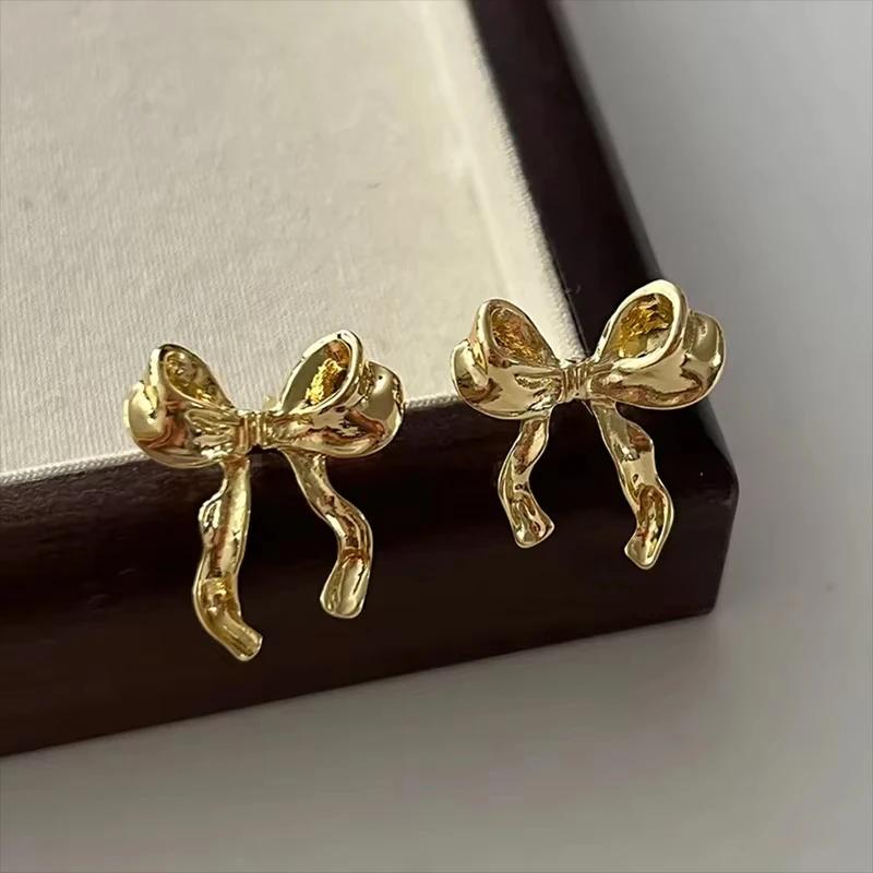 Vintage Metal Bowknot Earrings For Women Sweet Elegant Gold Color Dainty Stud Earrings Christmas Party Gift Zircon Accessories
Vintage Metal Bowknot Earrings For Women Sweet Elegant Gold Color Dainty Stud Earrings Christmas Party Gift Zircon Accessories