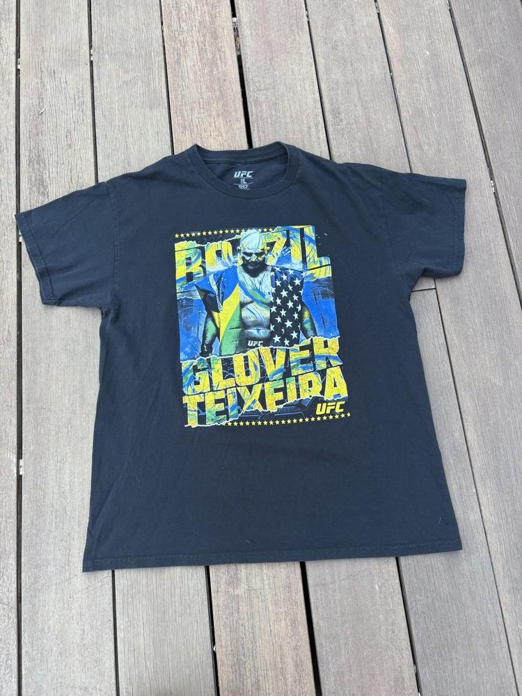 Футболка Glover Teixeira Мужская Размер L Черная UFC MMA Бразилия Американский Флаг Футболка Унисекс Футболка L
Футболка Glover Teixeira Мужская Размер L Черная UFC MMA Бразилия Американский Флаг Футболка Унисекс Футболка L