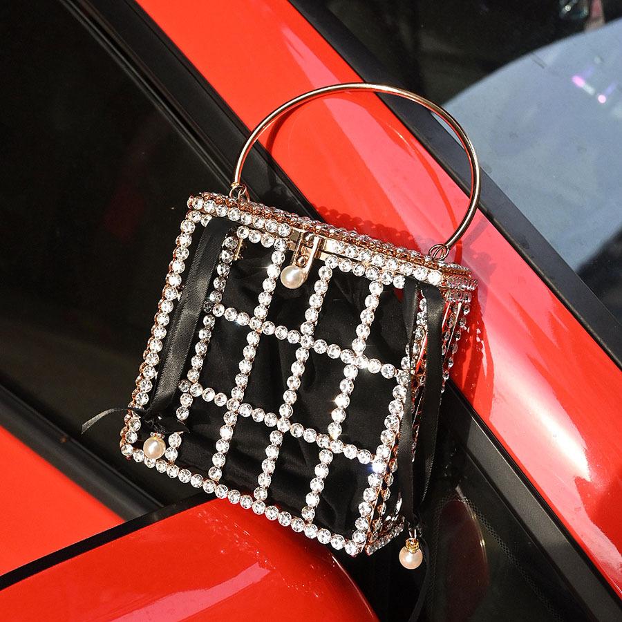 Diamond-encrusted birdcage pearl diamond bag dinner party metal vegetable basket bucket messenger bag чёрный
Diamond-encrusted birdcage pearl diamond bag dinner party metal vegetable basket bucket messenger bag чёрный