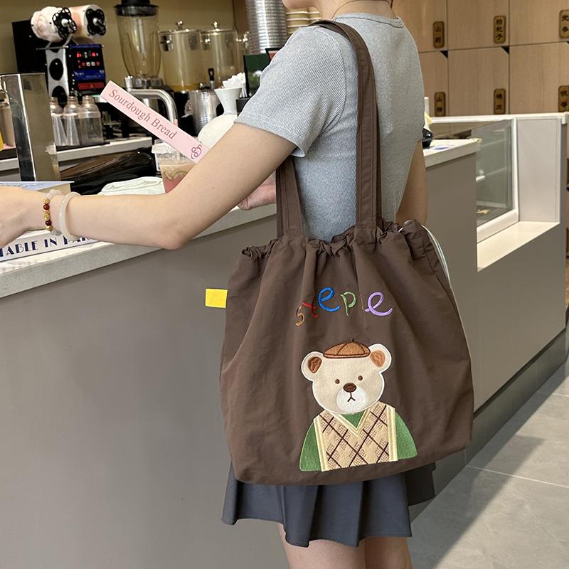 Cute Candy Color Women s Nylon Shoulder Bag Cartoon Embroidery Female Drawstring Handbags Casual Ladies Portable Shopping Bags
Cute Candy Color Women s Nylon Shoulder Bag Cartoon Embroidery Female Drawstring Handbags Casual Ladies Portable Shopping Bags