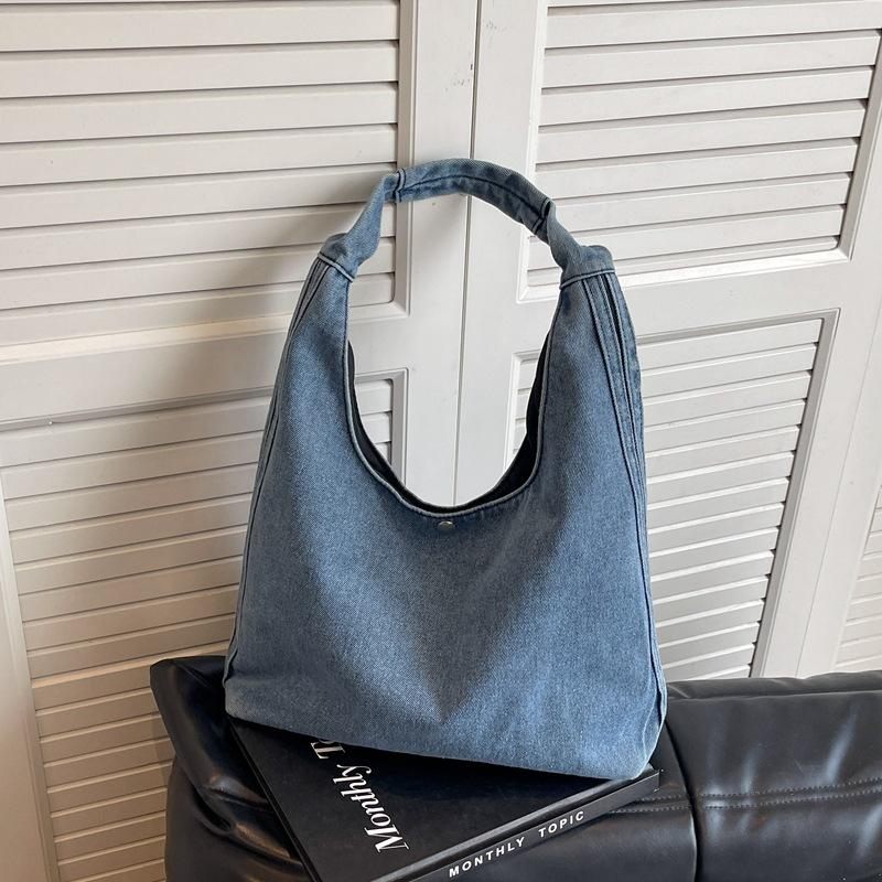 Casual denim large-capacity shoulder tote bag women s summer new work handbag underarm bag чорний
Casual denim large-capacity shoulder tote bag women s summer new work handbag underarm bag чорний