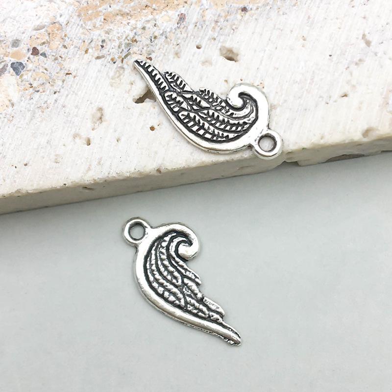 Античный серебряный сплав полые крылья подвеска шарм для DIY ювелирных изделий
Античный серебряный сплав полые крылья подвеска шарм для DIY ювелирных изделий