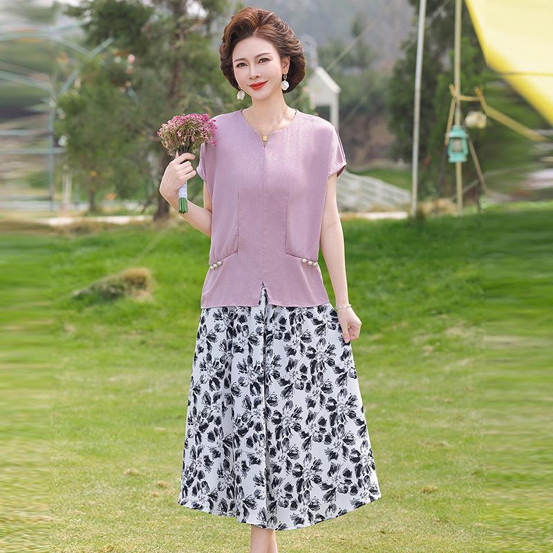 Women s Floral Two-Piece Set: Short-Sleeve Top & Elegant Long Skirt, Plus Size, Summer Mother s Outfit. 3XL 130-145 jin
Women s Floral Two-Piece Set: Short-Sleeve Top & Elegant Long Skirt, Plus Size, Summer Mother s Outfit. 3XL 130-145 jin