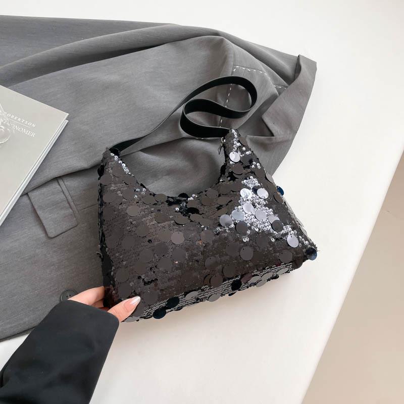 Популярный нишевый дизайн большая сумка-тоут с пайетками 2025 весна и лето модная повседневная новая сумка под плечо в иностранном стиле чёрный
Популярный нишевый дизайн большая сумка-тоут с пайетками 2025 весна и лето модная повседневная новая сумка под плечо в иностранном стиле чёрный