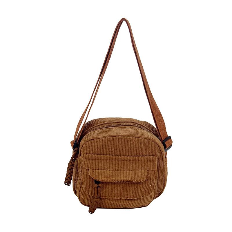 Corduroy bag women s shoulder bag fashion versatile messenger bag campus style small square bag коричневий
Corduroy bag women s shoulder bag fashion versatile messenger bag campus style small square bag коричневий