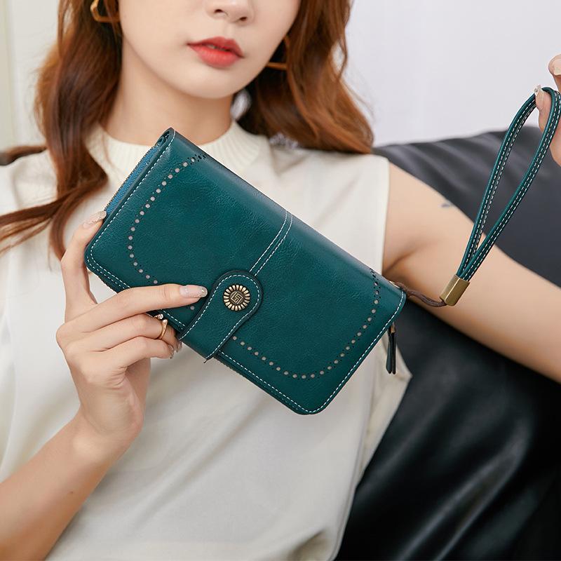 New anti-theft brush women s wallet long zipper wallet large capacity clutch bag peacock синього кольору
New anti-theft brush women s wallet long zipper wallet large capacity clutch bag peacock синього кольору