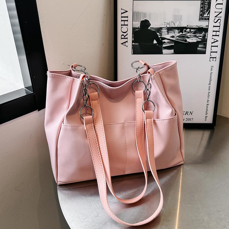 Large-capacity bag women s 2024 spring and summer new Korean version fashion one-shoulder underarm bag, commuting to work, portable tote bag рожевий
Large-capacity bag women s 2024 spring and summer new Korean version fashion one-shoulder underarm bag, commuting to work, portable tote bag рожевий