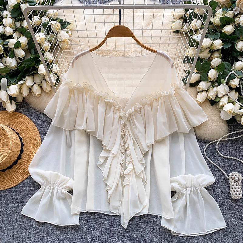 Women s top for summer 2026, casual and elegant style, with ruffle trim and bell sleeves, chiffon blouse one size fits all абрикосовий
Women s top for summer 2026, casual and elegant style, with ruffle trim and bell sleeves, chiffon blouse one size fits all абрикосовий