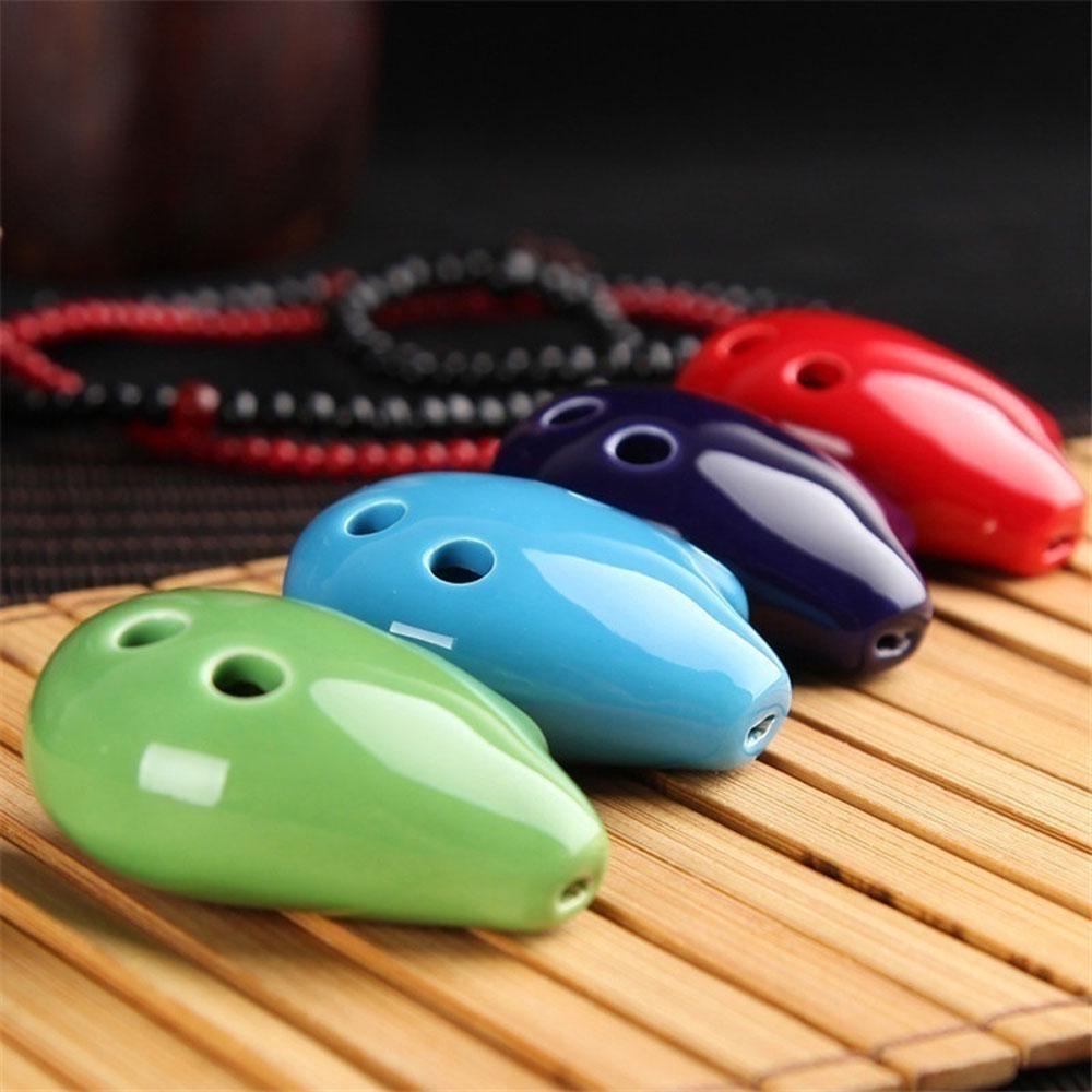 Random Color Students Musical Instruments Flute Educational Kid s Toy Ocarina 6 Hole Ceramic C Key random color
Random Color Students Musical Instruments Flute Educational Kid s Toy Ocarina 6 Hole Ceramic C Key random color