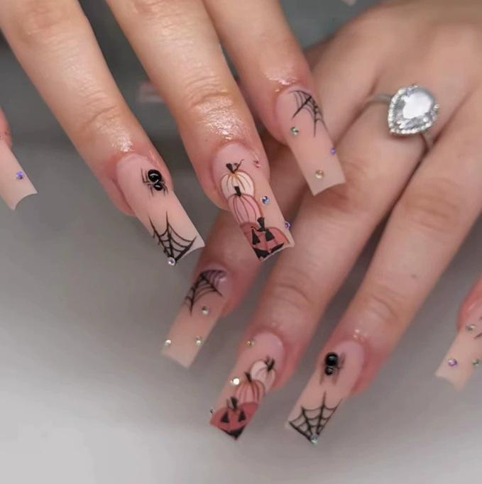 24-Piece Halloween Nail Set: Removable Pumpkin, Spider Web, and Rhinestone False Nails Black Jelly Glue + Buffer (Shein platform)
24-Piece Halloween Nail Set: Removable Pumpkin, Spider Web, and Rhinestone False Nails Black Jelly Glue + Buffer (Shein platform)