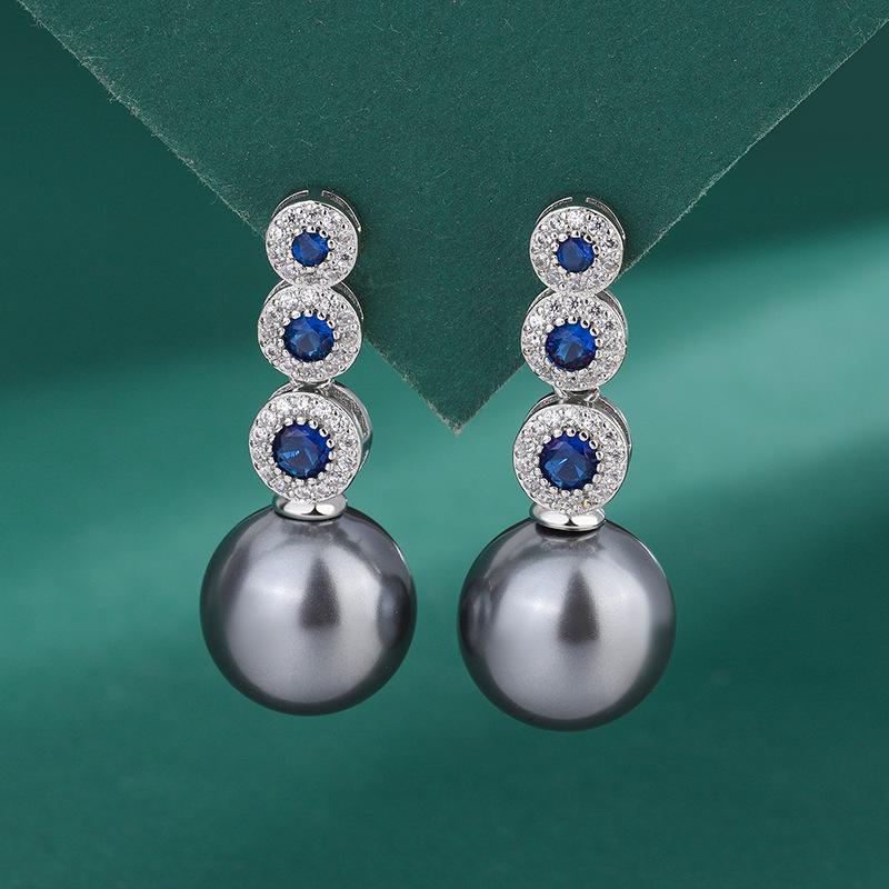 Серебряные микросерьги-гвоздики с синим циркониевым жемчугом, женские индивидуальные украшения, серьги с белым ракушечным жемчугом, роскошные темпераментные жемчужные серьги
Серебряные микросерьги-гвоздики с синим циркониевым жемчугом, женские индивидуальные украшения, серьги с белым ракушечным жемчугом, роскошные темпераментные жемчужные серьги
