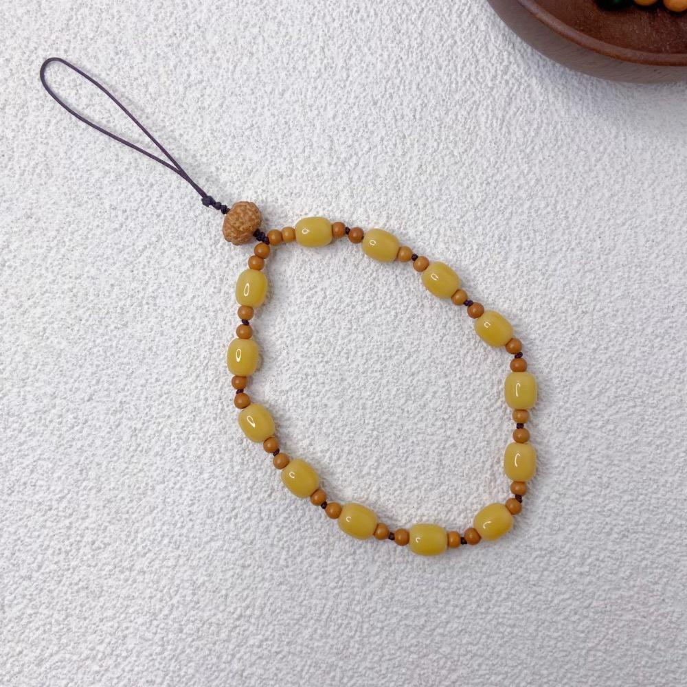New natural olive core beads imitation agate beads Chinese style advanced sense anti-lost hand carry pendant mobile phone chain
New natural olive core beads imitation agate beads Chinese style advanced sense anti-lost hand carry pendant mobile phone chain