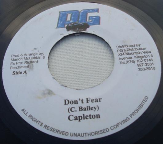 7inch Record CAPLETON / SINGER J & NEW KIDZ - Don t Fear / Wine Yu Body NONE PG Music 2004 Jamaica Reggae, Ska & Dub Used
7inch Record CAPLETON / SINGER J & NEW KIDZ - Don t Fear / Wine Yu Body NONE PG Music 2004 Jamaica Reggae, Ska & Dub Used