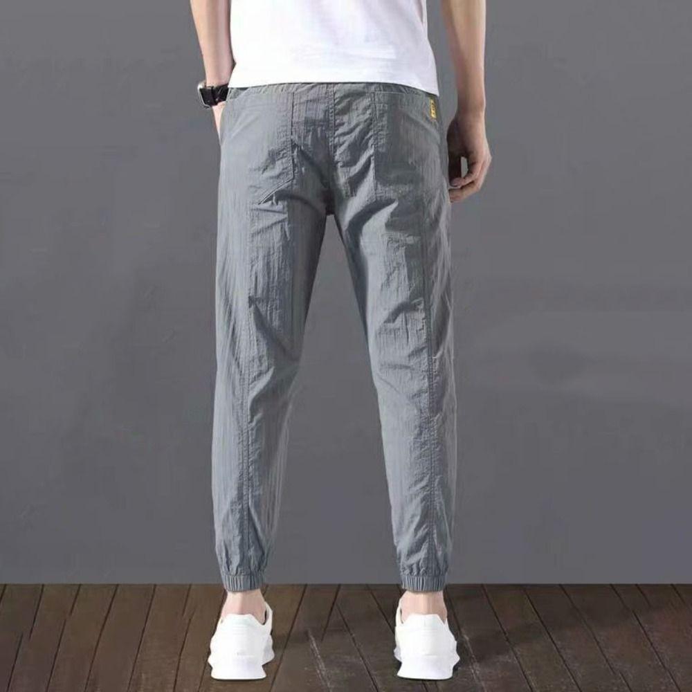 Швидкосихаючі ультратонкі спортивні штани Letter Joggers Sweatpants Simple Men s Ice Pants Summer 4XL
Швидкосихаючі ультратонкі спортивні штани Letter Joggers Sweatpants Simple Men s Ice Pants Summer 4XL