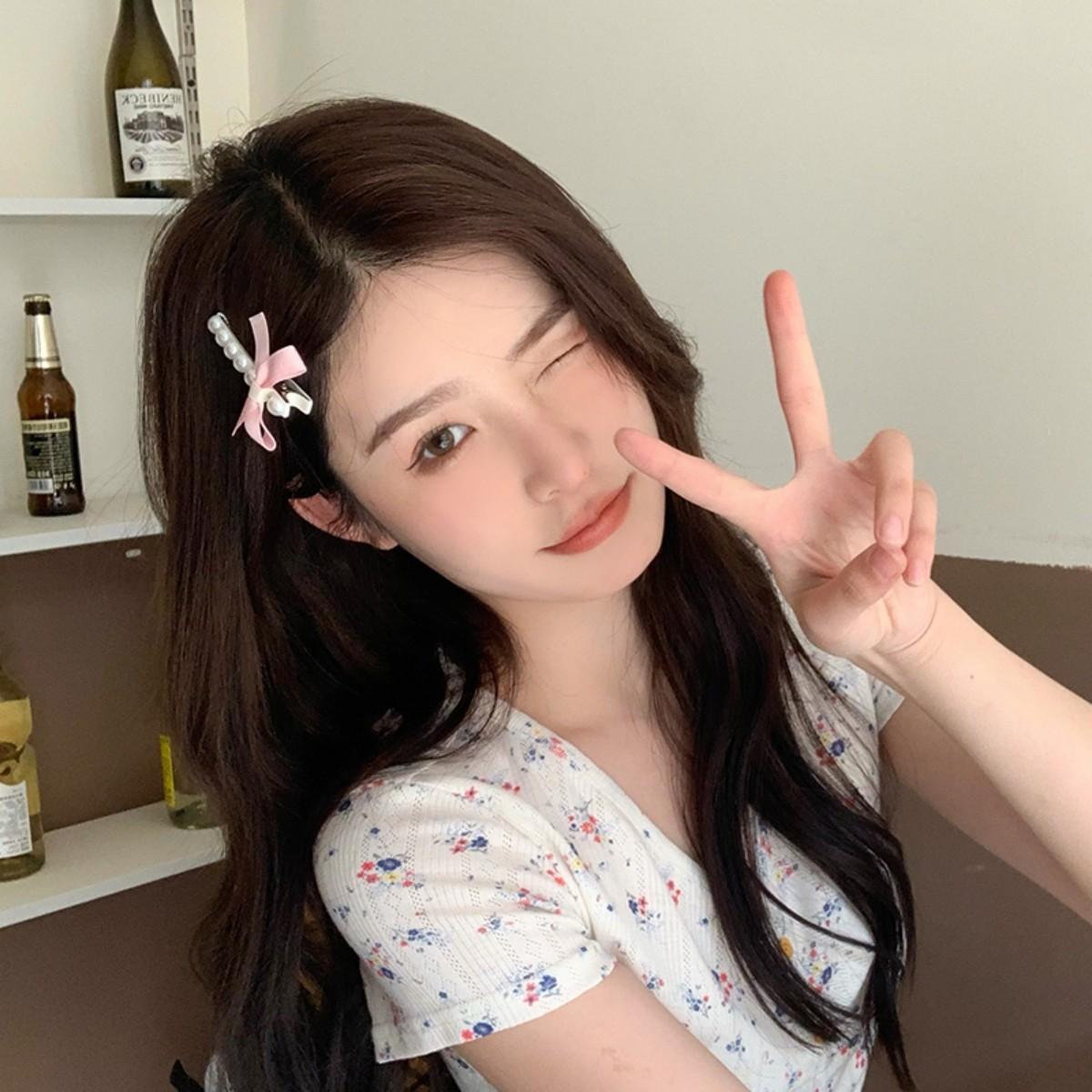 Pink bow pearl hairpin sweet and cute side bangs clip broken hair small clip girl heart hair accessories
Pink bow pearl hairpin sweet and cute side bangs clip broken hair small clip girl heart hair accessories