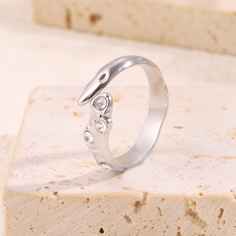 Titanium Steel Zircon Ring: Colorful, Irregular Design, Versatile Fashion for Women
Titanium Steel Zircon Ring: Colorful, Irregular Design, Versatile Fashion for Women