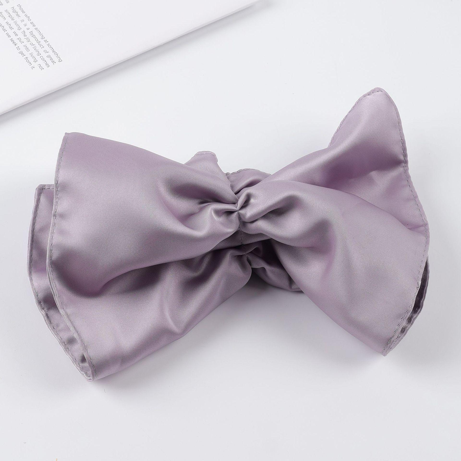 Korean Satin Bow Hair Clip for Women: Elegant Fashion Ponytail Accessory
Korean Satin Bow Hair Clip for Women: Elegant Fashion Ponytail Accessory