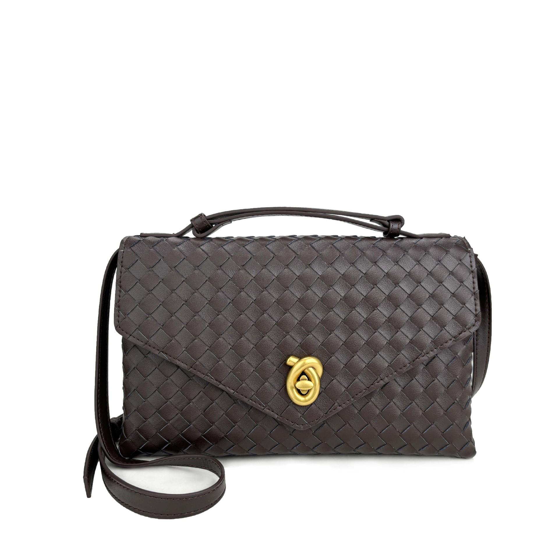 Cross Border Новая кожаная вязаная маленькая квадратная женская сумка с модным замком и большой вместимостью, ручная сумка через плечо 29x7x19cm
Cross Border Новая кожаная вязаная маленькая квадратная женская сумка с модным замком и большой вместимостью, ручная сумка через плечо 29x7x19cm