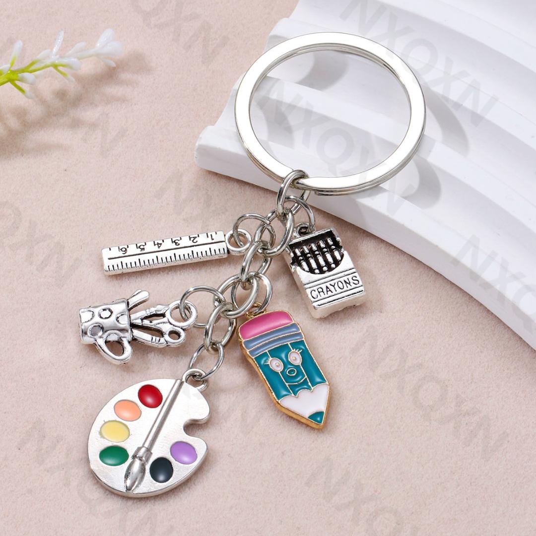 Classic Drawing Board Ruler Crayon Pencil Enamel Keychain Apple Brush Pendants For Women Men Good Teacher Gift Handmade Jewelry
Classic Drawing Board Ruler Crayon Pencil Enamel Keychain Apple Brush Pendants For Women Men Good Teacher Gift Handmade Jewelry