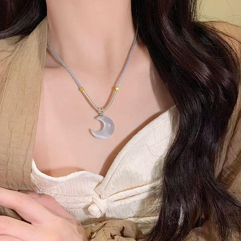New Chinese style cool white moonlight cat s eye stone moon necklace fairy crescent Zen ancient style national style braided rope clavicle chain
New Chinese style cool white moonlight cat s eye stone moon necklace fairy crescent Zen ancient style national style braided rope clavicle chain