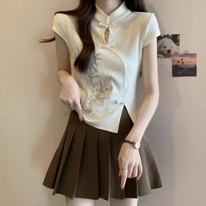 women bamboo embroidered qipao style top short sleeve mandarin collar side slit casual fitted knit blouse S абрикосовий
women bamboo embroidered qipao style top short sleeve mandarin collar side slit casual fitted knit blouse S абрикосовий