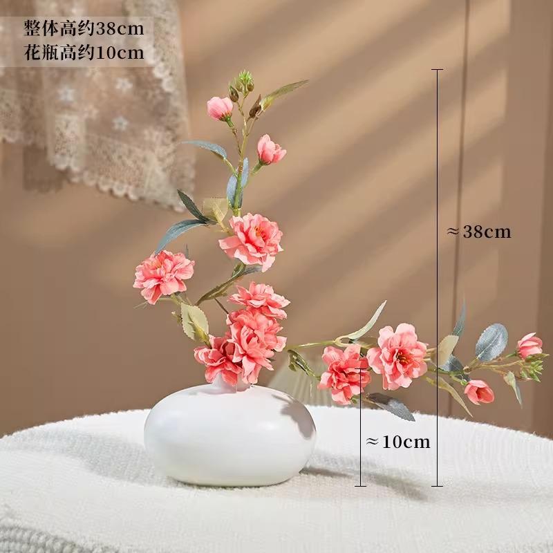 Camellia simulated flower fake flower arrangement plastic flower living room flowerdecoration
Camellia simulated flower fake flower arrangement plastic flower living room flowerdecoration
