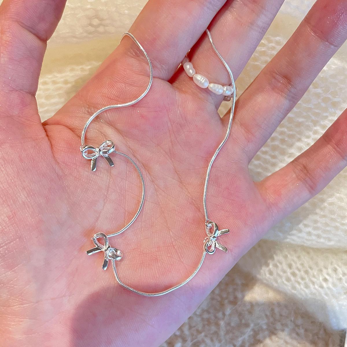 Ожерелье-бант из стерлингового серебра 925 пробы, женское, легкая роскошь, нишевое, высококлассное, со звездообразным цирконом, нежное, темпераментное, цепочка для ключицы, новое 925 silver
Ожерелье-бант из стерлингового серебра 925 пробы, женское, легкая роскошь, нишевое, высококлассное, со звездообразным цирконом, нежное, темпераментное, цепочка для ключицы, новое 925 silver