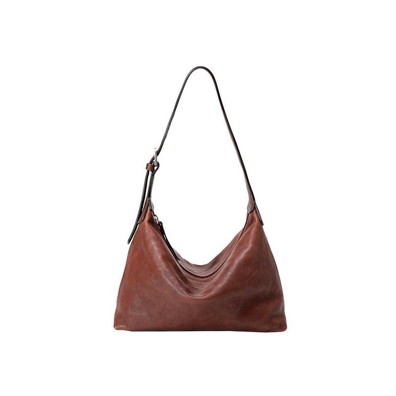 Underarm bag head layer vegetable tanned cowhide commuter tote bag casual leather dumpling bag single shoulder oblique span bag темно-коричневого кольору
Underarm bag head layer vegetable tanned cowhide commuter tote bag casual leather dumpling bag single shoulder oblique span bag темно-коричневого кольору