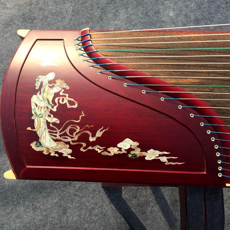 Гучжен з палісандра з різьбленим інкрустованим візерунком павича - Професійна модель для виступів
Гучжен з палісандра з різьбленим інкрустованим візерунком павича - Професійна модель для виступів