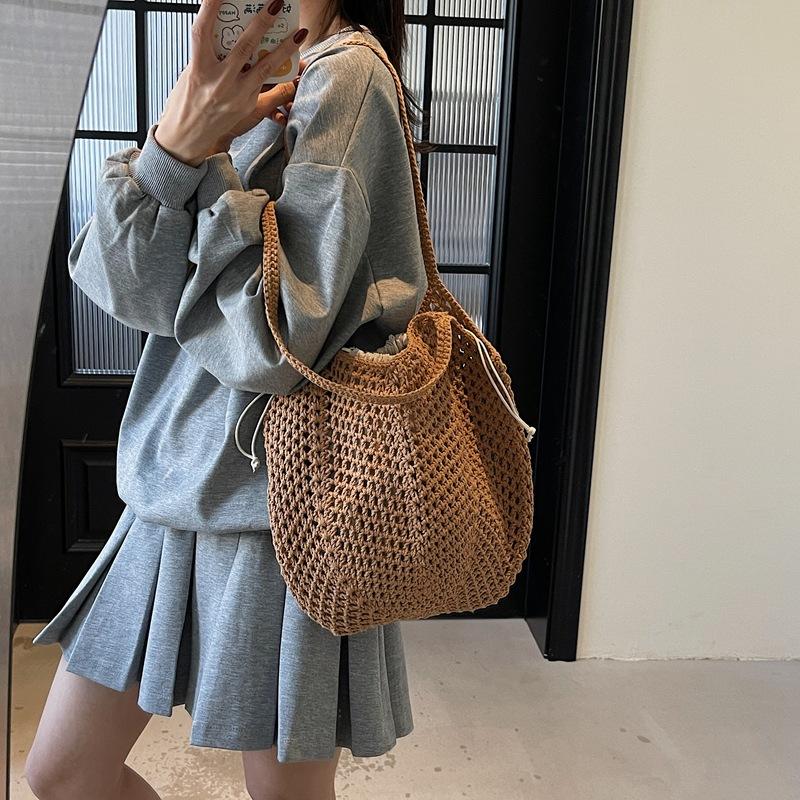 2025 spring and summer new hollow bucket bag shoulder woven bag large capacity tote bag fashionable beach women s bag
2025 spring and summer new hollow bucket bag shoulder woven bag large capacity tote bag fashionable beach women s bag