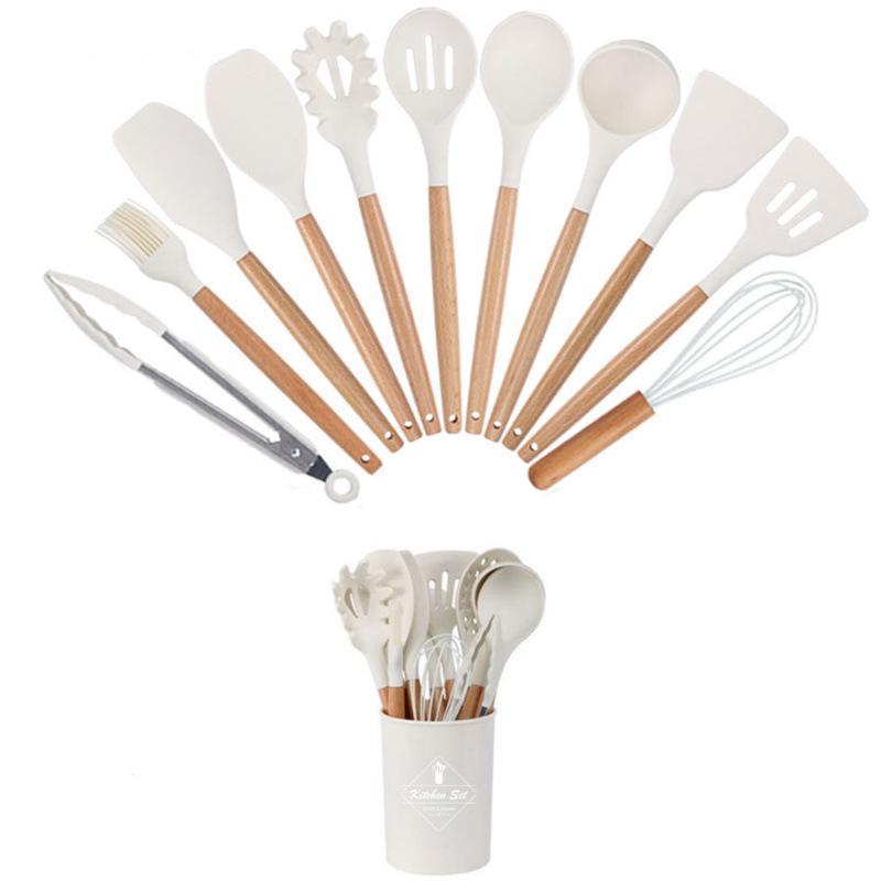 44-Piece Silicone Kitchen Tool Set with Wood Handles: Non-Stick Spatulas, Soup Ladles & Cookware.
44-Piece Silicone Kitchen Tool Set with Wood Handles: Non-Stick Spatulas, Soup Ladles & Cookware.
