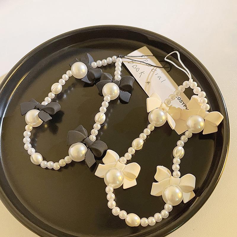 Korean Charm Bow Mobile Phone Chain For Women Girls Telephone Charms Strap Acrylic Pearl Beaded Phone Lanyard Key Strap бежевый
Korean Charm Bow Mobile Phone Chain For Women Girls Telephone Charms Strap Acrylic Pearl Beaded Phone Lanyard Key Strap бежевый