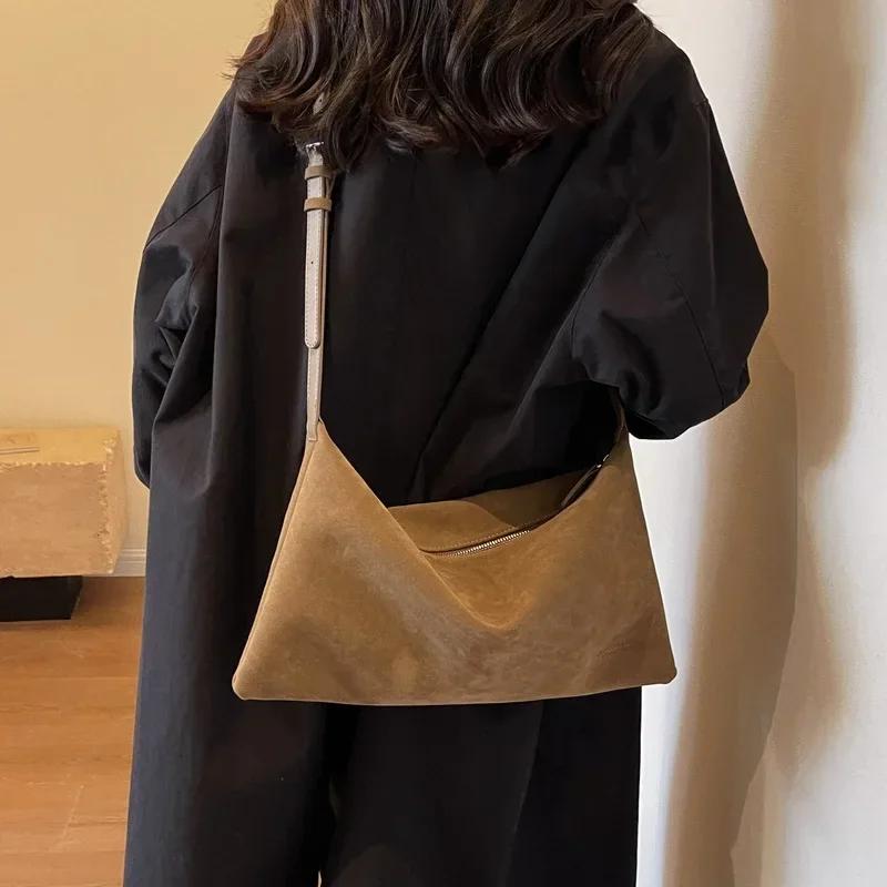 В этом году новая сумка через плечо в стиле ретро «ленивый», минималистская сумка-тоут, большая вместительная сумка для поездок на работу, сумки через плечо
В этом году новая сумка через плечо в стиле ретро «ленивый», минималистская сумка-тоут, большая вместительная сумка для поездок на работу, сумки через плечо