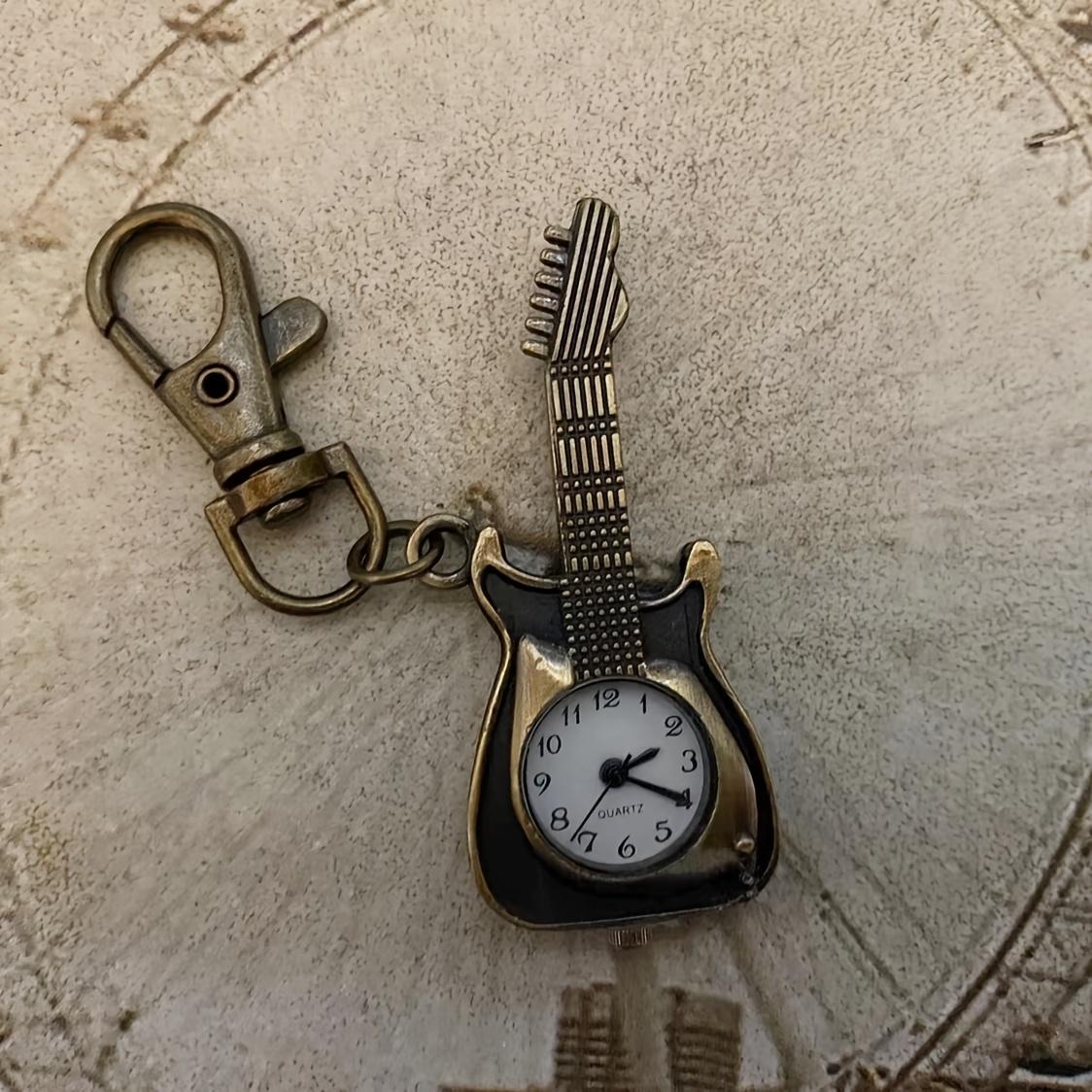Classic retro guitar backpack keychain pendant watch for male and female students cartoon cute accessories коричневий
Classic retro guitar backpack keychain pendant watch for male and female students cartoon cute accessories коричневий