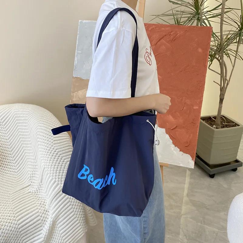 Solid Colour Women s Beach Shoulder Bag Letter Design Ladies Tote Canvas Bags Large Capacity Drawstring Female Shopping Handbag темно-синий
Solid Colour Women s Beach Shoulder Bag Letter Design Ladies Tote Canvas Bags Large Capacity Drawstring Female Shopping Handbag темно-синий