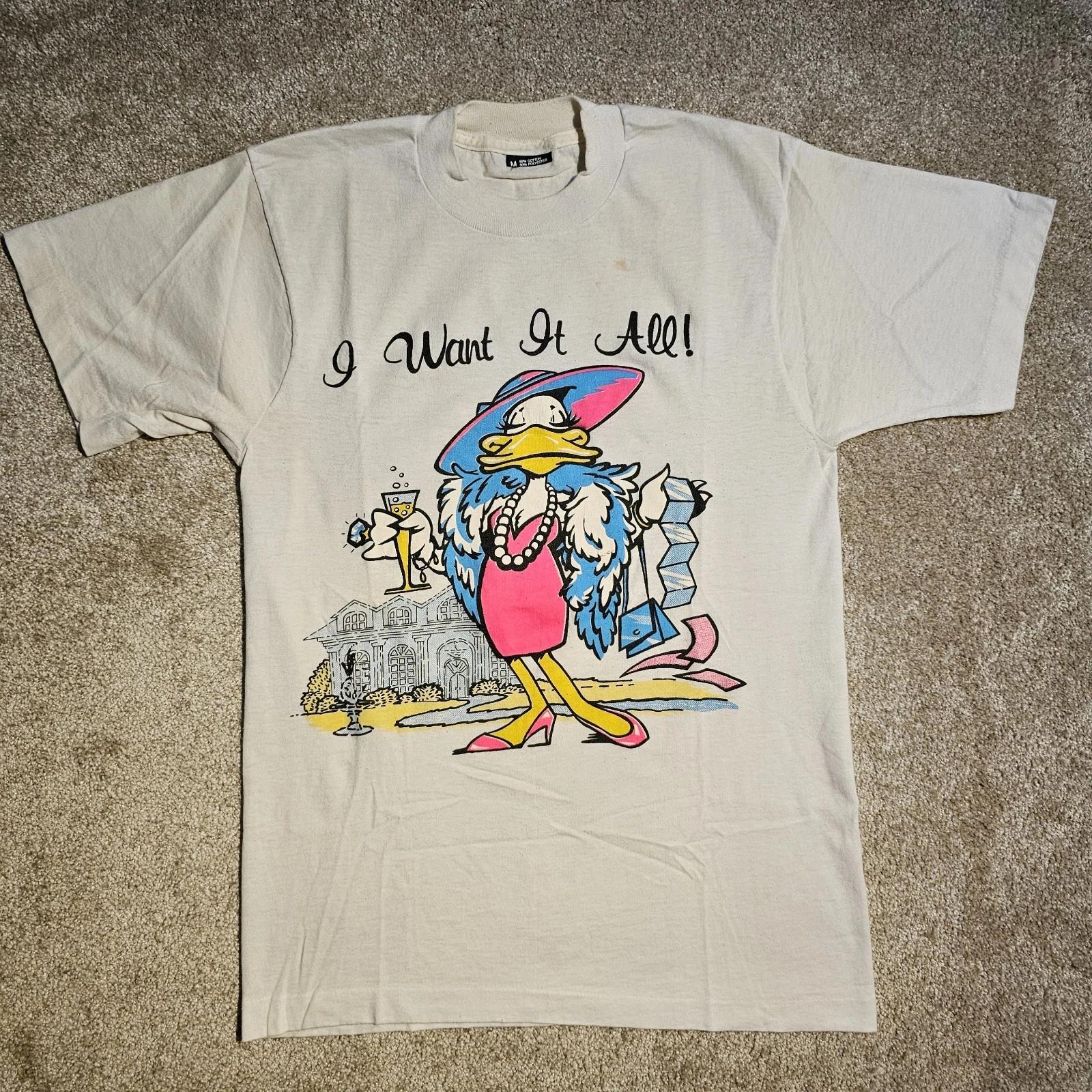 Vintage 80s 90s Glam Duck I Want It All! T-shirt Mens M Brat Y2k Distressed Rave 2XL
Vintage 80s 90s Glam Duck I Want It All! T-shirt Mens M Brat Y2k Distressed Rave 2XL