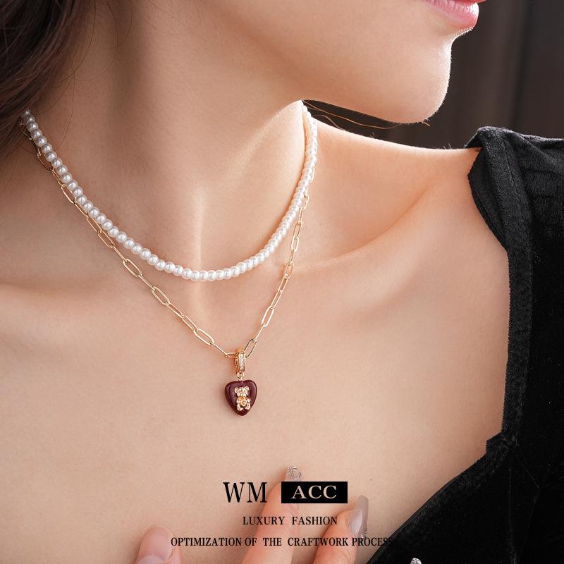 Double-Layer Pearl Bear Necklace: French Luxury Clavicle Chain in Retro Fashion Style
Double-Layer Pearl Bear Necklace: French Luxury Clavicle Chain in Retro Fashion Style