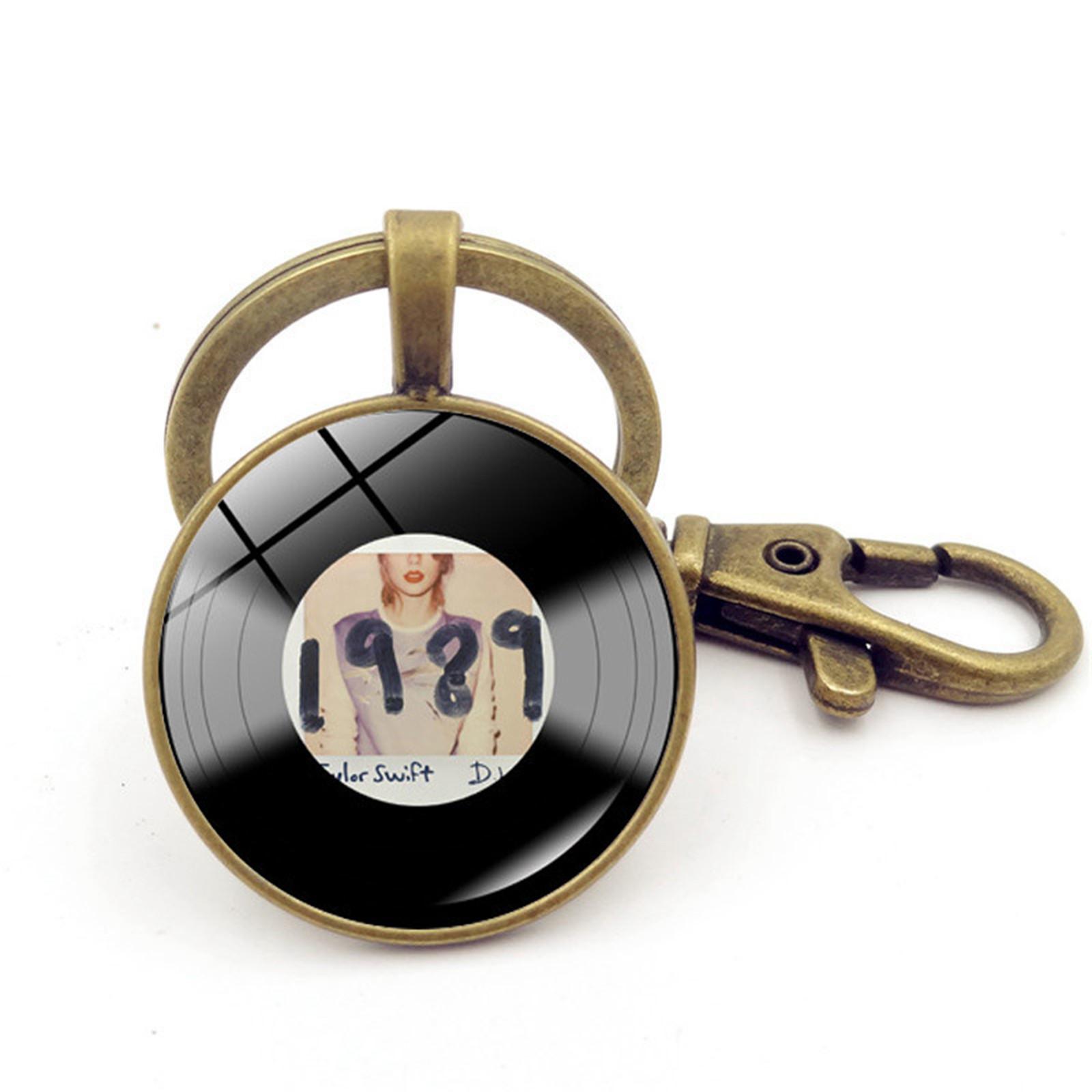 Vintage Style Round Vinyl Record Keychain Pendant with Lobster Clasp Durable Metal Alloy Key Ring Accessory for Everyday Use One Size
Vintage Style Round Vinyl Record Keychain Pendant with Lobster Clasp Durable Metal Alloy Key Ring Accessory for Everyday Use One Size