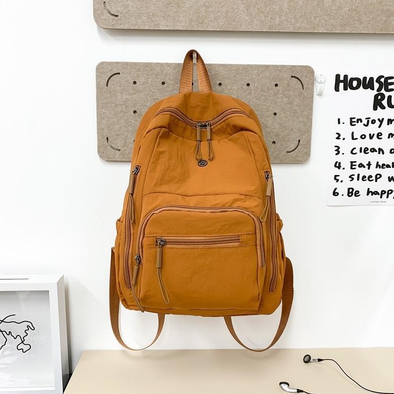 Lightweight schoolbag female solid color water-proof multi-pocket computer commuting backpack college student class travel backpack оранжевый
Lightweight schoolbag female solid color water-proof multi-pocket computer commuting backpack college student class travel backpack оранжевый